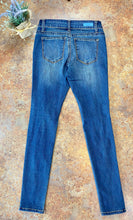 Load image into Gallery viewer, DENIM ARTS MID-RISE MEDIUM WASH SKINNY JEANS | JUDY BLUE - THAW Boutique 
