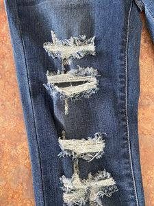 HIGH- RISE DISTRESSED MEDIUM WASH SKINNY JEANS | JUDY BLUE - THAW Boutique 