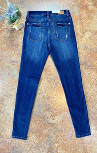 MID-RISE DARK WASH W/ MILD DISTRESSED SKINNY JEANS | JUDY BLUE - THAW Boutique 